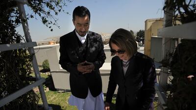 US Representative Nancy Pelosi, a Democrat from California, takes a walk with Abdul Rauf Ibrahimi, Speaker of the Lower House of the Afghan Parliament at the US Embassy in Kabul, Afghanistan on March 20, 2011. US Department of State
