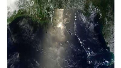 Oil can be seen as a shimmering area reflecting the light back into space more vividly than the normal reflectance of water in this satellite photo taken on Wednesday, June 9, 2010.