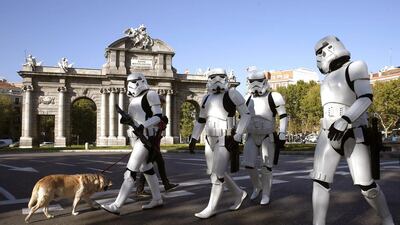 Impersonators of Star Wars’ storm troopers walk in front of the Puerta del Alcala monument as part of the exhibition ‘Face the Force’ in Madrid, Spain. Juan Carlos Hidalgo / EPA