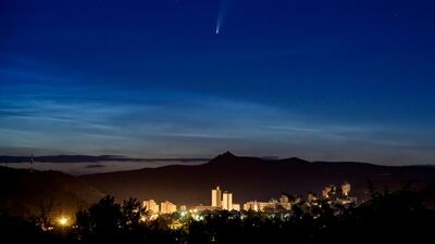 The Comet Neowise is seen above Salgotarjan, Hungary, on Friday. Peter Komka / EPA
