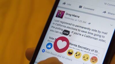 Facebook’s new emoji icons have been well-received. AP Photo