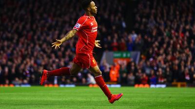 Raheem Sterling of Liverpool celebrates as he scores the team's first goal during their Premier League match against Newcastle United at Anfield on April 13, 2015 in Liverpool, England. Clive Brunskill/Getty Images