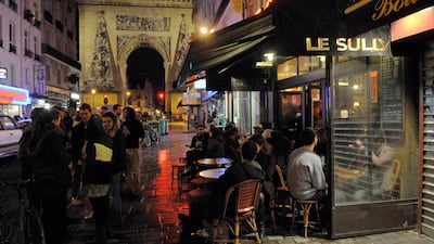 Teeming crowds pack out the street’s restaurants, cafes and food stores. AFP