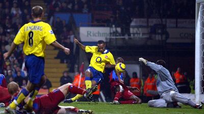 Arsenal's Thierry Henry scores against Crystal Palace in 2004. AFP