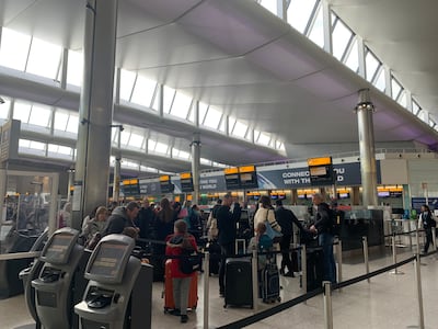 Passengers queue for check-in at Heathrow Airport’s Terminal 2. Photo: Laura O’Callaghan / The National