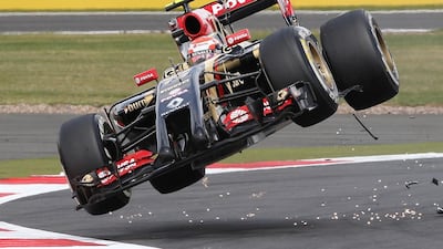Lotus F1 team driver Pastor Maldonado goes off the track after colliding with Sauber driver Esteban Guitiererrez during the British Grand Prix at the Silverstone Race Circuit, central EnglandPaul Hackett / Reuters