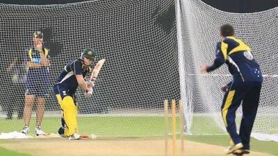 David Warner, the Australia opening batsman, has a go at the nets in Abu Dhabi. Ravindranath K / The National