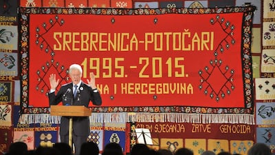 Former US president Bill Clinton delivers a speech at Potocari in Bosnia and Herzegovina, during a ceremony marking the 20th anniversary of the 1995 Srebrenica massacre. The strikes by the US in Syria have been compared to Mr Clinton’s intervention. Elvis Barukcic / AFP Photo