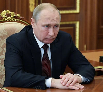 Vladimir Putin creates an idea of a world in turmoil, which only his government is able to defend ordinary Russians from. Alexei Nikolsky / AP Photo