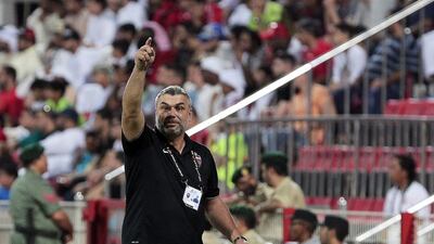 Dubai, United Arab Emirates - October 27, 2014. Cosmin Olaroiu ( Head Coach, Al Ahli ) at their ongoing match against the tough Al Ain, of the AGL football. ( Jeffrey E Biteng / The National )