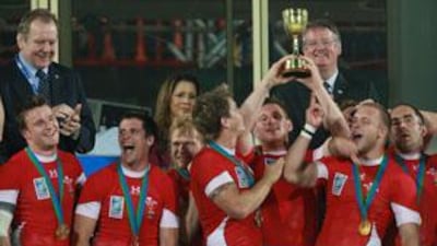 Wales celebrate with the Melrose Cup after winning the final of the 2009 Rugby Sevens World Cup against Argentina.