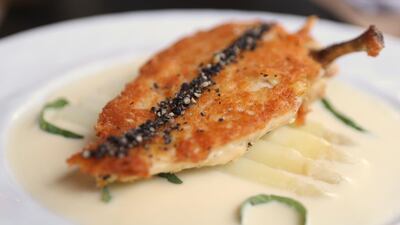 Parmesan-crusted chicken with basil and lemon butter. Delores Johnson / The National