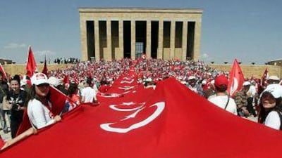 Supporters of Turkey's secular system display a giant national flag outside the tomb of the national hero Mustafa Kemal Ataturk in Ankara.