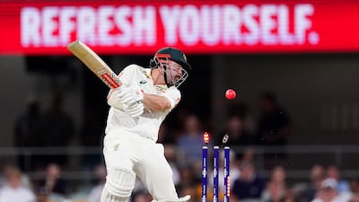 Australia opener Travis Head is bowled by England's Gus Atkinson for 22. PA