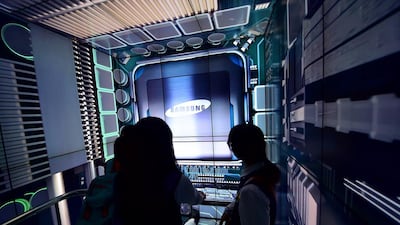 Samsung reported a near 50 per cent fall in third quarter net profit, as its key smartphone business faltered amid growing competition from Chinese firms in the increasingly saturated market. JUNG YEON-JE / AFP