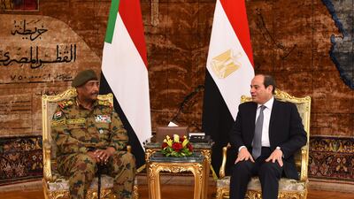 General Abdel Fattah Al Burhan, head of the Sudanese Transitional Military Council, held talks with Egyptian President Abdel Fattah El Sisi in Cairo on 25 May 2019. Egyptian Presidency / EPA