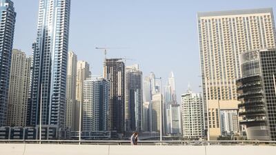 Prices in prime areas such as Dubai Marina, above, continue to edge lower. Reem Mohammed / The National