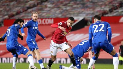 United's Mason Greenwood surrounded by Everton defenders. AFP