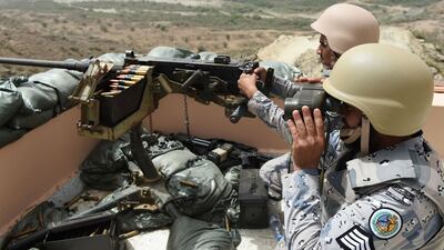 Members of the Saudi border guard are stationed at a look-out point on the Saudi-Yemeni border, in southwestern Saudi Arabia, on April 9, 2015. AFP Photo