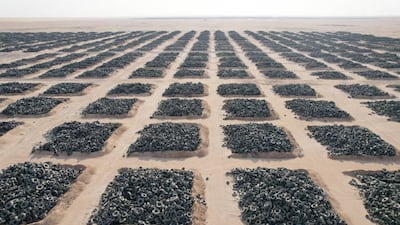 A tyre graveyard at Sulaibiya, five kilometres south of Al Jahra near Kuwait City, Kuwait. Discarded tyres stored as landfill threaten the environment and human health because they take a long time to degrade and contain dangerous components.