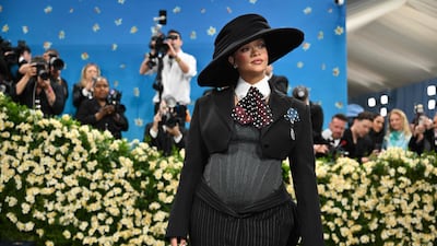 Rihanna wears a look by Marc Jacobs. Her partner, A$AP Rocky is co-chairman of this year's gala. AFP