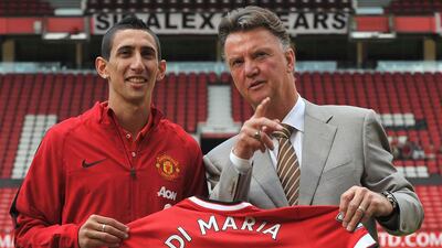 Louis van Gaal, right, has a clear idea on what direction he wants Angel Di Maria to bring the club. Steve Parkin / AFP