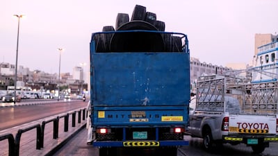 Cargo it taken from large lorries and loaded onto dhows at the creek. Reem Mohammed / The National
