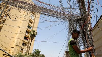 Electric cables in Saadoun Street in Baghdad, on July 29, 2018. AFP