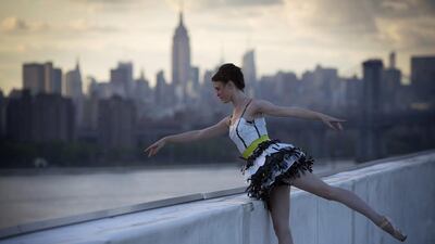 A model takes part in the “Trashion” fashion show on the roof of a building in the Brooklyn Navy Yard in the Brooklyn borough of New York. The show featured designers who used recycled items such as coffee filters, tissue paper, grain sacks and window screens. Carlo Allegri / Reuters