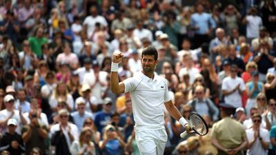 Djokovic celebrates after winning. EPA
