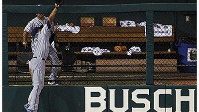 The American League's Carl Crawford makes the catch on a ball hit by Brad Hawpe of the Colorado Rockies during the seventh inning in St Louis.