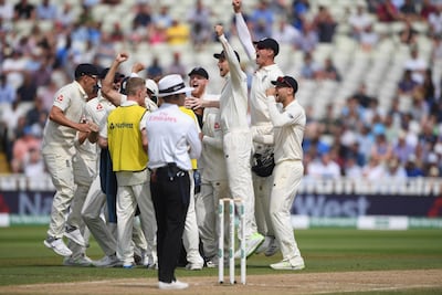 England captain Joe Root, third from right, and his teammates celebrate the wicket of Ishant Sharma. Getty Images