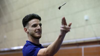 England's Declan Rice plays darts at Al Wakrah Sports Club. Reuters