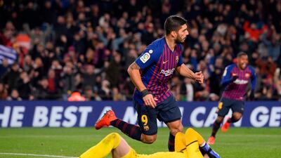 Luis Suarez runs off in celebration in front of Leganes goalkeeper Pichu Cuellar. AFP