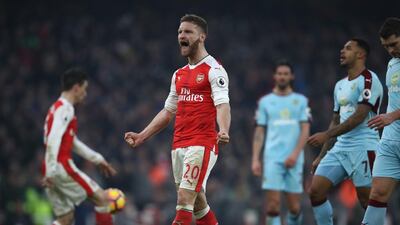 Shkodran Mustafi of Arsenal celebrates his side's 2-1 win after the Premier League match against Burnley at the Emirates Stadium on Sunday night. Julian Finney / Getty Images