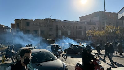 Tear gas fills a street in Tehran after Iranian shopkeepers and traders protested against the dire economic conditions in the country. EPA