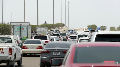 The screening facility close to Ghantoot has had to turn away crowds and temporarily close due to demand and numbers. Pawan Singh / The National