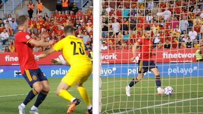 Spain's Pablo Sarabia scores their second goal. Reuters