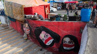 An anti-government mural at Tahrir Square. AP