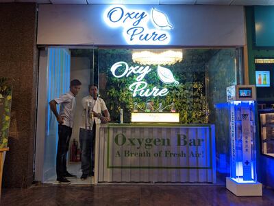A customer inhaling clean air using a cannula strapped at their nostrils at Oxy Pure, an oxygen bar at Select Citywalk mall in New Delhi on Saturday. Taniya Dutta for The National