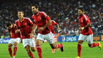 Al Ahly's forward Mohamed Aboutrika, centre, celebrates after scoring a goal during the African Champions League first leg final between South Africa's Orlando Pirates and Egypt's Al-Ahly in Soweto on November 2. The two sides meet again Sunday in Cairo. Alexander Joe / AFP