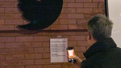 A sign mocking new Twitter owner Elon Musk has been posted outside the social media company's corporate office in New York. EPA