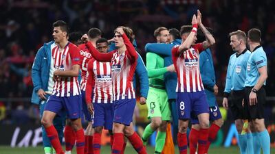 Atletico Madrid played applaud the fans at full-time. Reuters