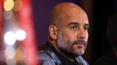 Pep Guardiola attends a press conference for the Premier League Asia Trophy in Shanghai. Getty Images