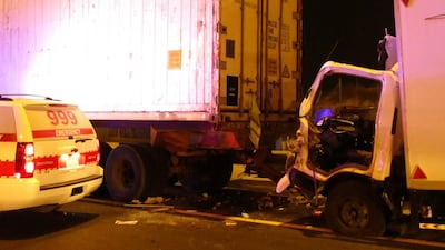 A man died and two others were injured in a crash between two lorries and a pick-up truck on Tuesday. Photo courtesy Dubai Police