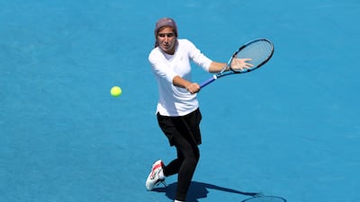 Meshkatolzahra Safi of Iran hit a backhand in her round one junior singles match against Anja Nayar of Australia. getty