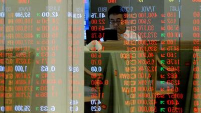 The Philippine Stock Exchange halted trading on Monday because of a technical glitch, but was not enough to cushion a 6.7 per cent decline in the PSE Index to 6,971.01 at the close. Noel Celis / AFP