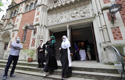 Muslims leave the church after Friday prayers. Reuters