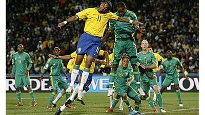 The odd position in which Brazil's Robinho, left centre, plays causes a tactical conundrum.