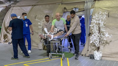A patient from Gaza arrives for treatment at the UAE's floating hospital in Al Arish, Egypt. Photo: Wam